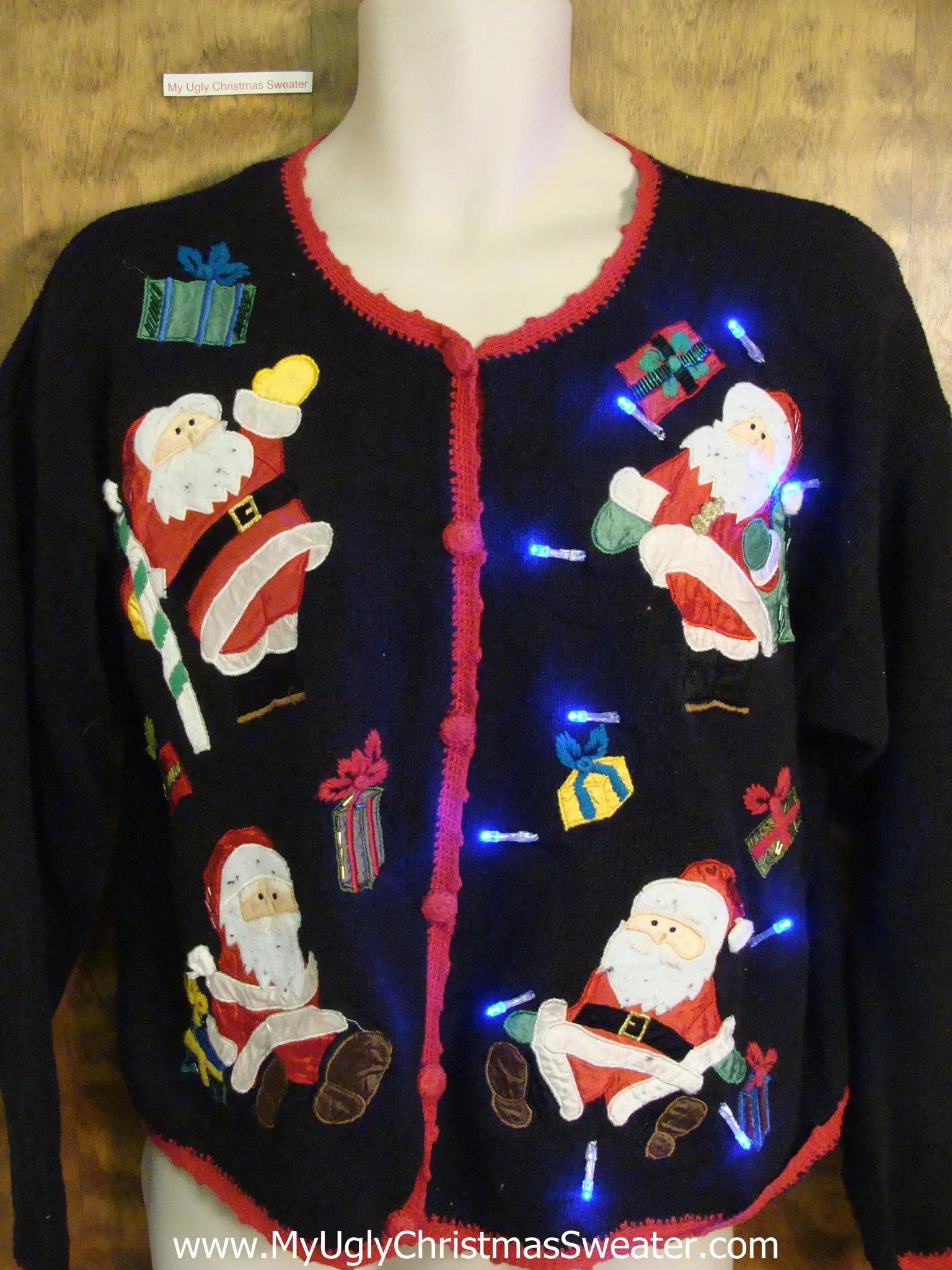 Four Athletic Santas Light Up Ugly Xmas Sweater