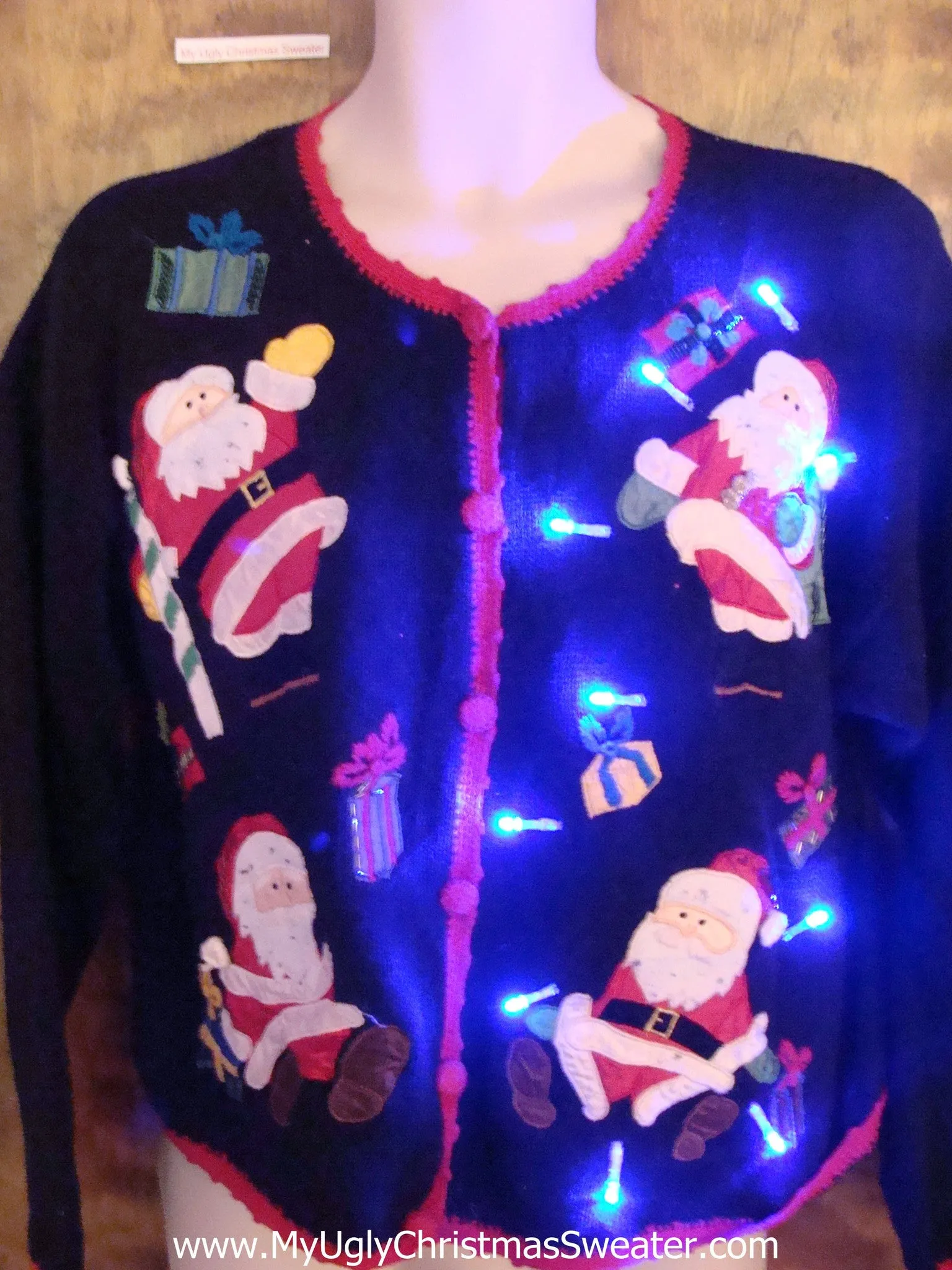 Four Athletic Santas Light Up Ugly Xmas Sweater